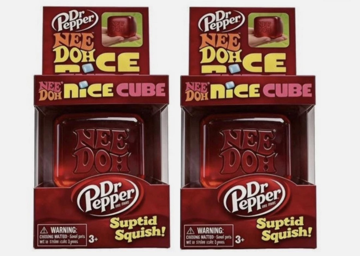Dr Pepper NeeDoh lookalike squishy toy held in hand