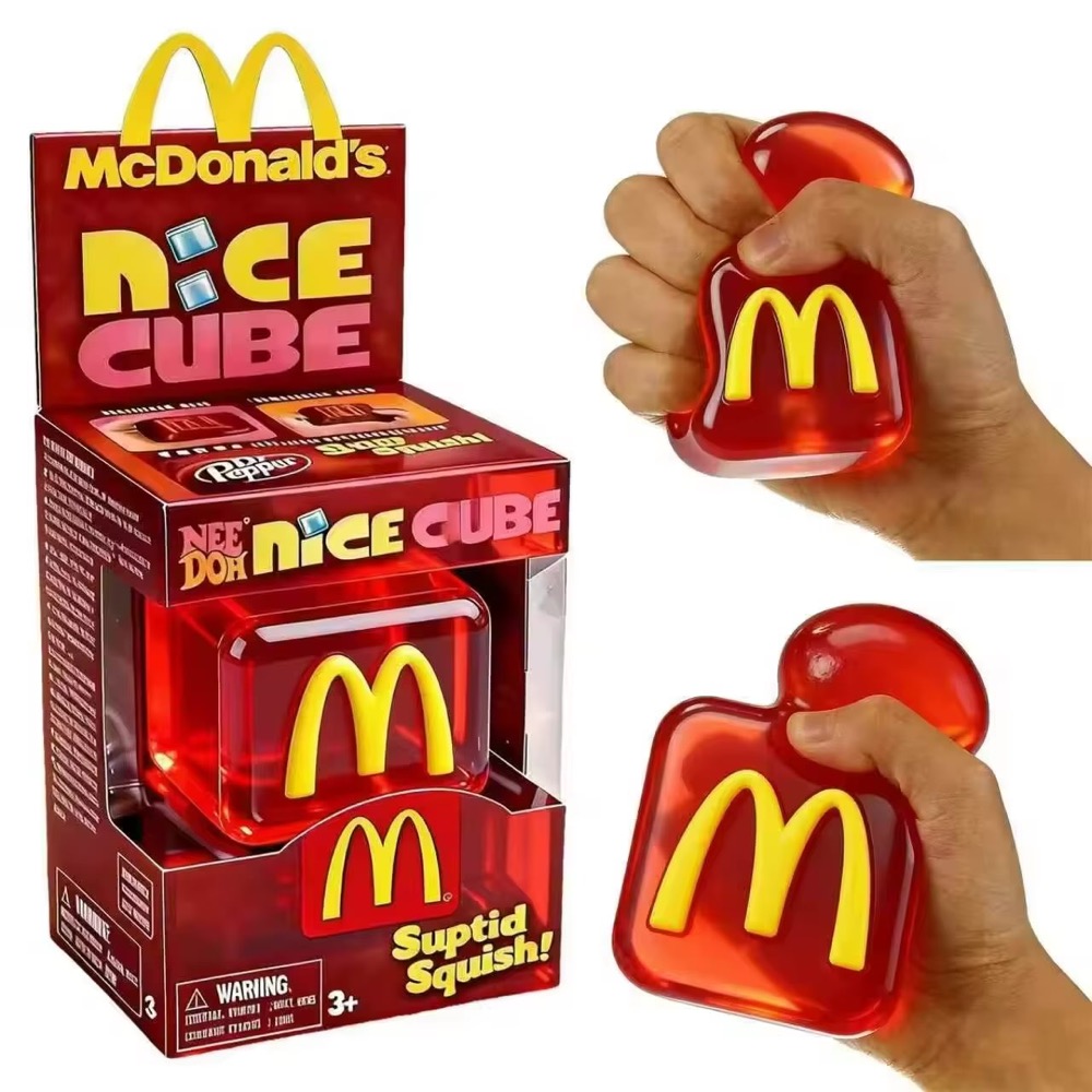 McDonald's NeeDoh style red cube with golden arches beside its Nice Cube box