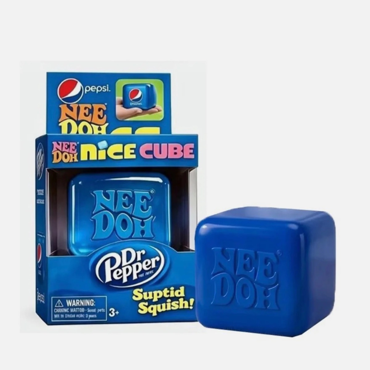 Blue Pepsi Nice Cube box beside a navy squishy cube with molded NeeDoh lettering