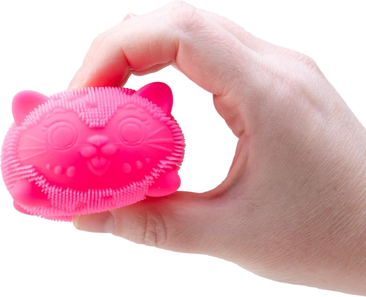 NeeDoh Wild Cats Fuzz Ball — pink cat being squeezed